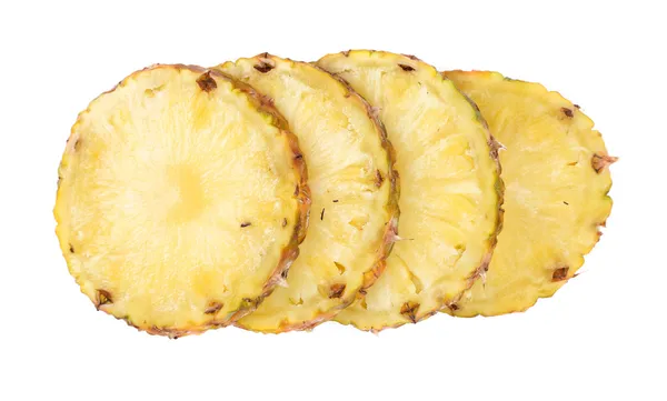 Row sliced pineapple on a white background. — Stock Photo, Image