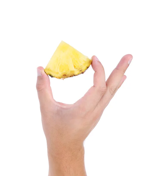 Ananaslı el beyaz zemin üzerinde bir — Stok fotoğraf