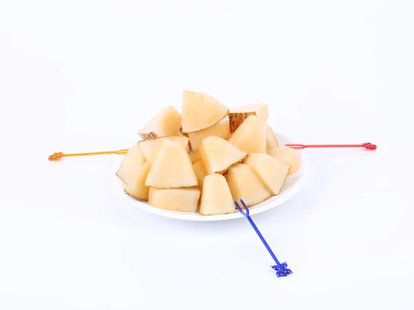 Manciata di fette di melone su uno sfondo bianco — Foto Stock