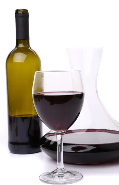 Karafy, láhve a sklenky vína — Stock fotografie