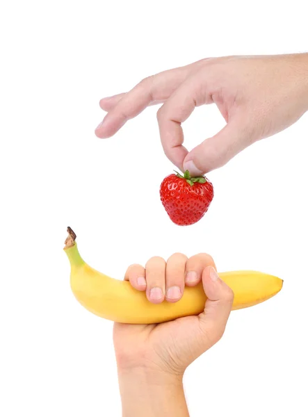 Mãos erguidas Morango e banana . — Fotografia de Stock