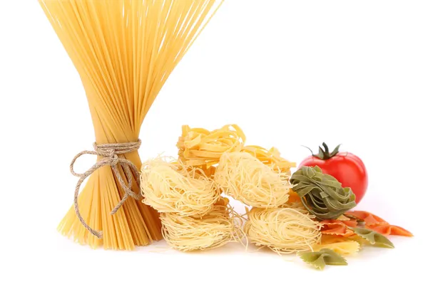 Different pasta and tomato — Stock Photo, Image