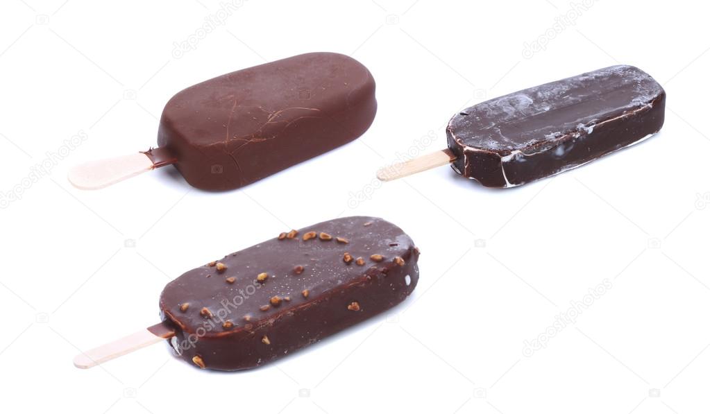 Different chocolate-coated blocks of ice cream.