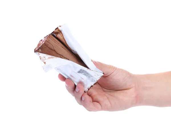 Roll of chocolate ice cream in foil. — Stock Photo, Image