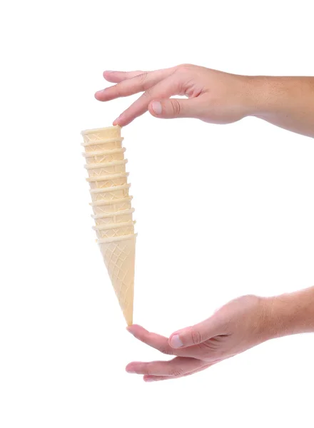 Hands holds stake of ice cream cones. — Stock Photo, Image