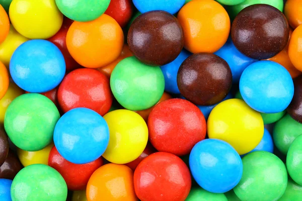 Backgroynd čokoládové kuličky v barevné glazury. — Stock fotografie