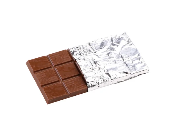 Bar of chocolate in foil. — Stock Photo, Image