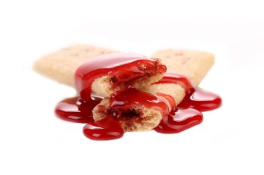 Bisküvi stics üzerinde akış kırmızı syrop.