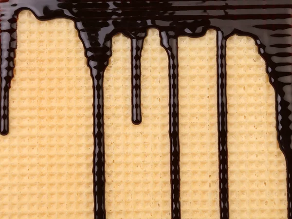 Background of wafer. Stream chocolate. — Stock Photo, Image