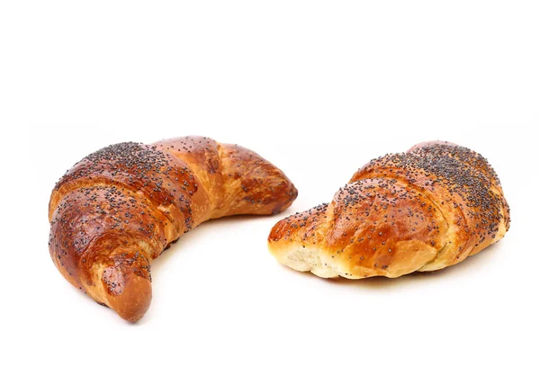 Aptitretande croissanter med vallmo. — Stockfoto