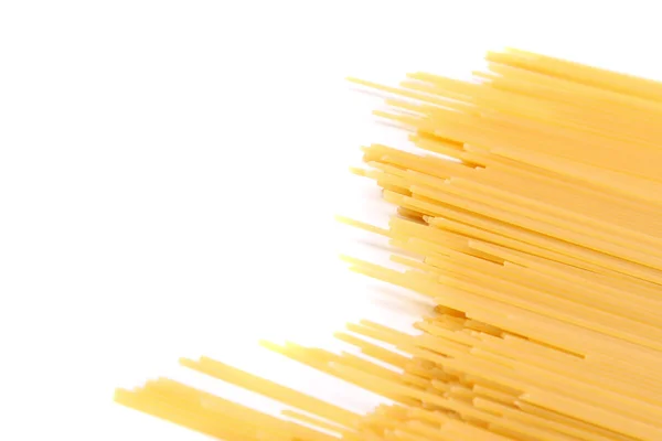 Spaghetti right and the white background left. — Stock Photo, Image