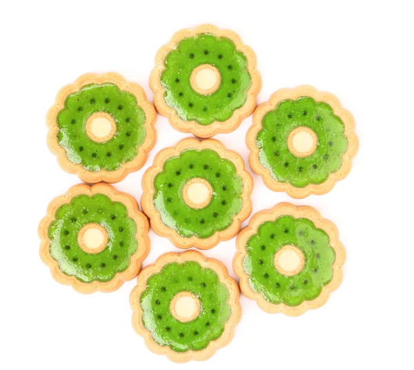 Hexahedron of biscuit with kiwi jam. — Stock Photo, Image