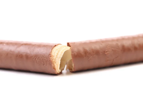 Nefunkční vafle roll potažené čokoládou. — Stock fotografie
