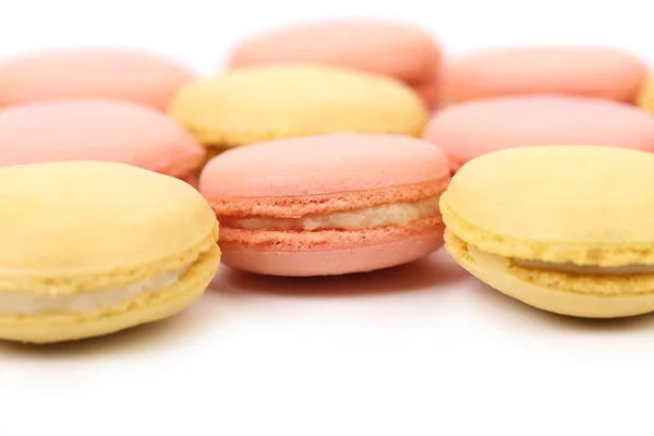 Achtergrond van zeven verschillende macaron gebak. — Stockfoto