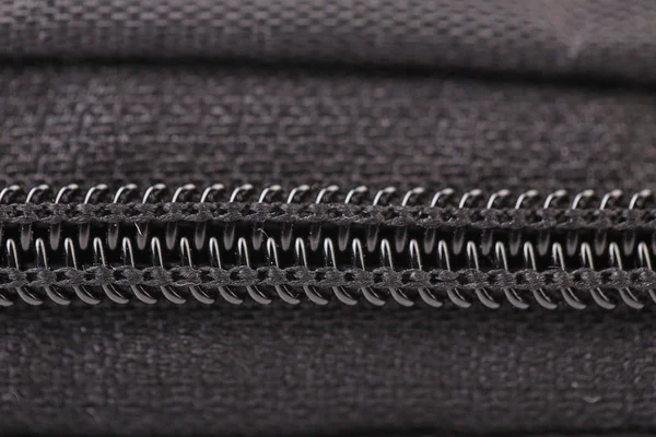 Plastic black zipper of case. Macro. — Stock Photo, Image