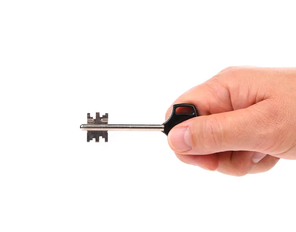 Hand houdt moderne staal-kunststof sleutel. — Stockfoto