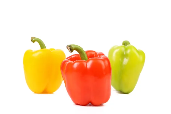 Три цветных перца — стоковое фото