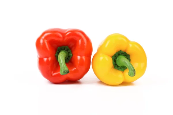 Svansar av röd och gul paprika — Stockfoto