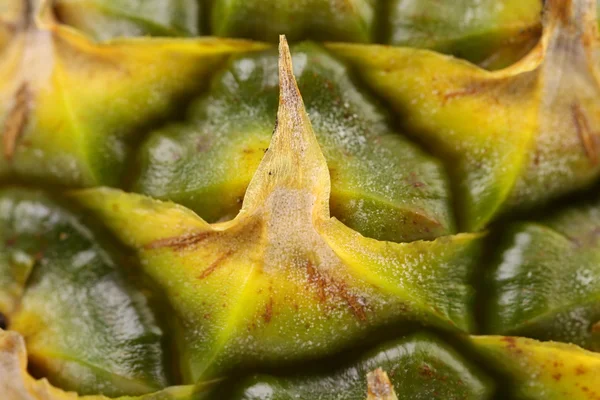 Close-up textuur van verse rijpe ananas. macro. — Stockfoto