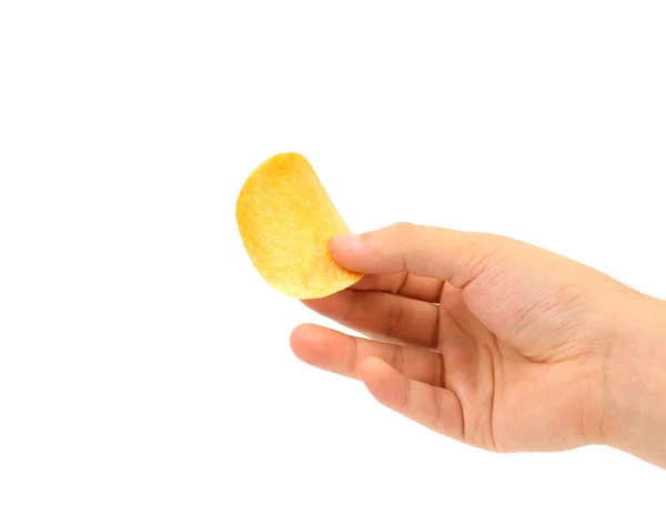 Patates cipsi elini tutar — Stok fotoğraf