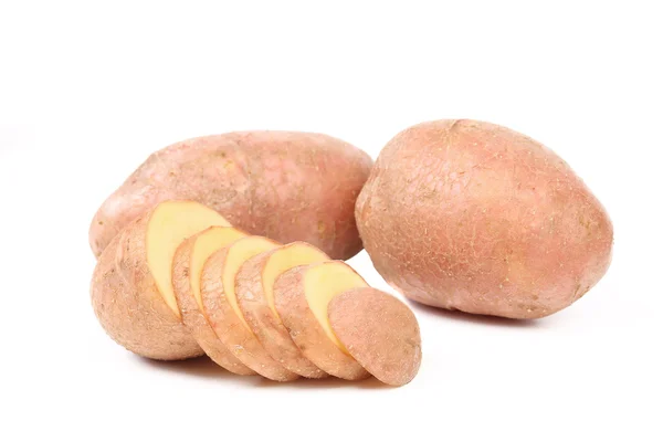 Ripe red potatoes and slices — Stock Photo, Image