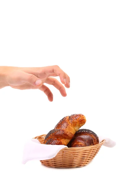 Mencapai tangan untuk croissant . — Stok Foto