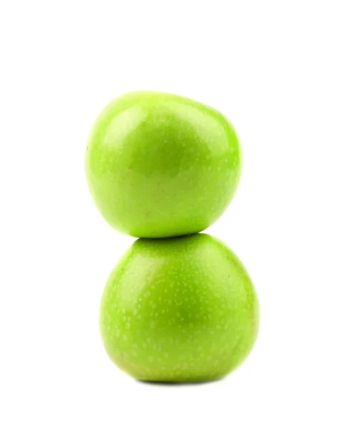 Två gröna äpplen. vertikala. närbild. — Stockfoto