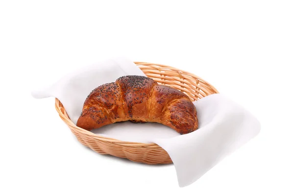 Image of croissant with poppy in a basket. — Stock Photo, Image