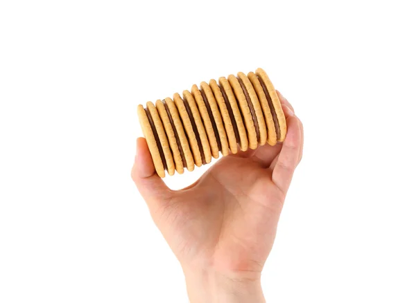 Hand holds closeup cookie biscuits with filling — Stock Photo, Image
