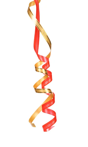 Röda och gyllene curl part serpentiner hängande — Stockfoto