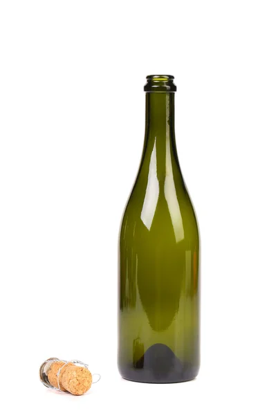 Empty green glass bottle from champagne and cork — Stock Photo, Image