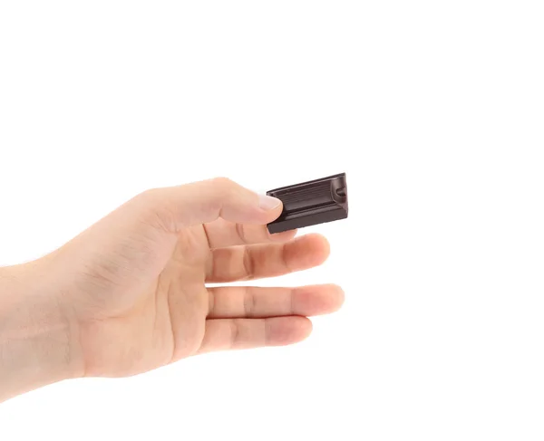 Hand holds chocolate bar. — Stock Photo, Image