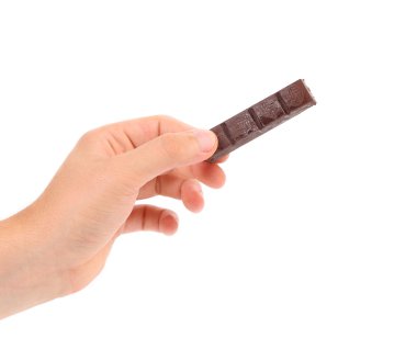 çikolata elini tutar.