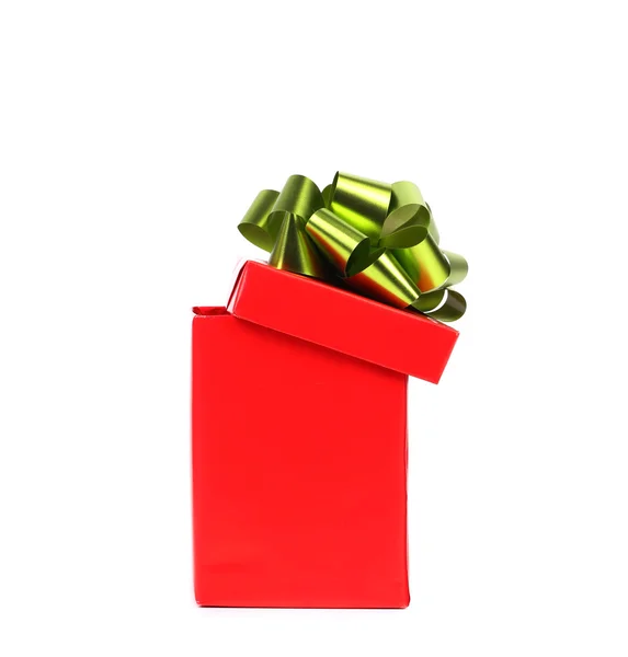 Opened red gift box with green-golden bow. — Stockfoto