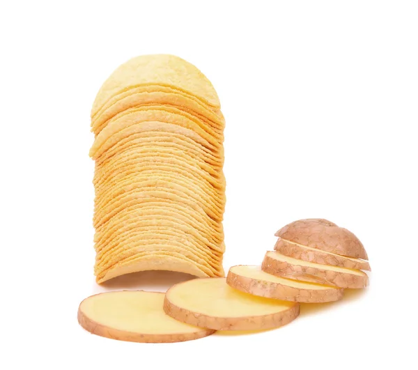 Potatoes slices and stack of chips. — Stock Photo, Image