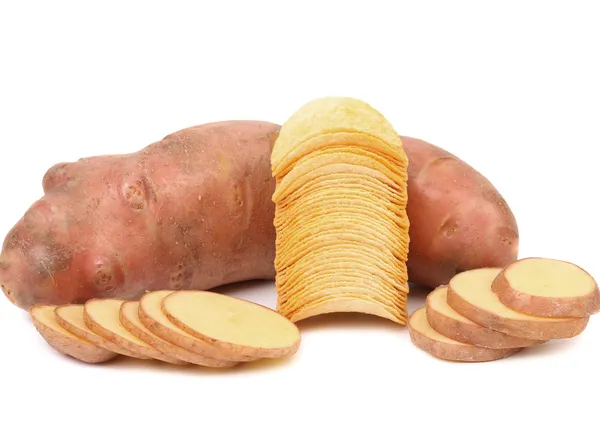 Tubers of potato, slices and stack chips. — Stock Photo, Image