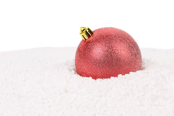 Christmas red ball on a snow. — Stock Photo, Image