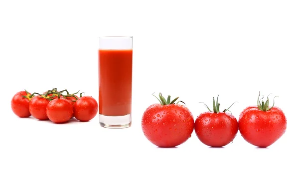 Pomodori e bicchiere di succo — Foto Stock