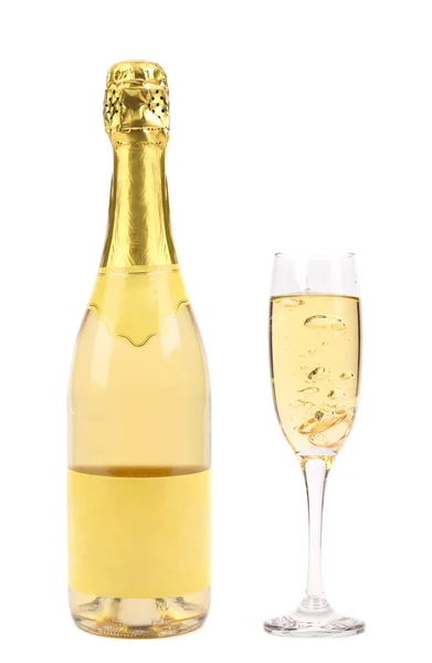 Goldish fles en glas champagne. — Stockfoto