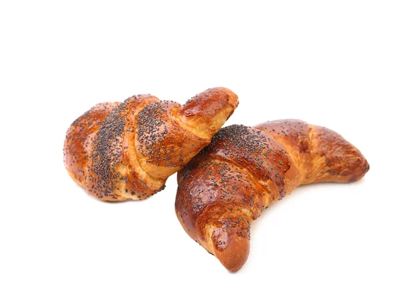 Croissants apetitosos com papoula . — Fotografia de Stock