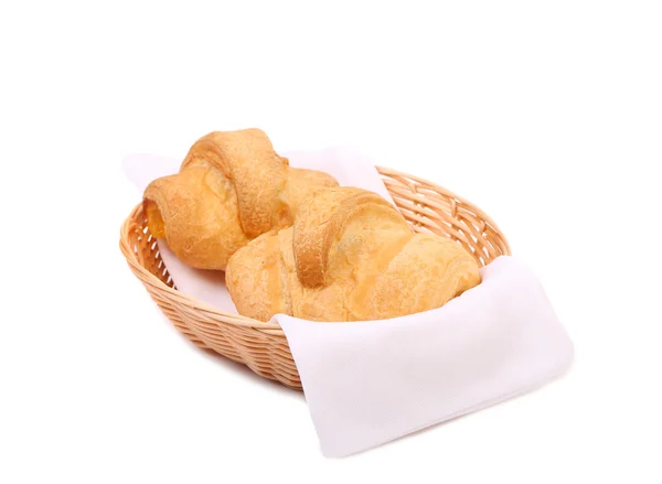 Croissants or crescent rolls in basket. — Stock Photo, Image