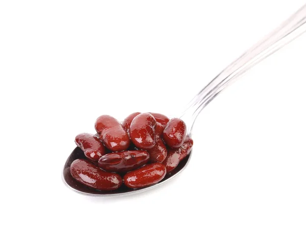 Preserve beans on a spoon. — Stock Photo, Image