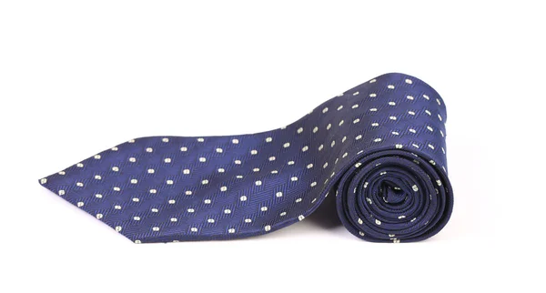 Blue male tie with white pattern rolled — Stock Photo, Image