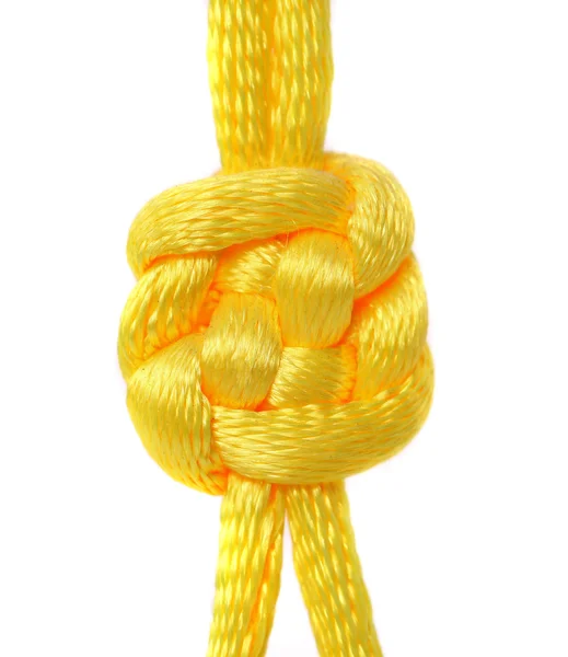 Knot of yellow silk lace. — Stock Photo, Image