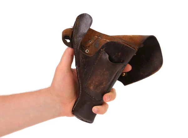 Hand holds old brown holster. — Stock Photo, Image