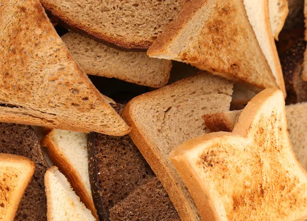 Hintergrund der Haufen Toastbrot. Nahaufnahme. — Stockfoto