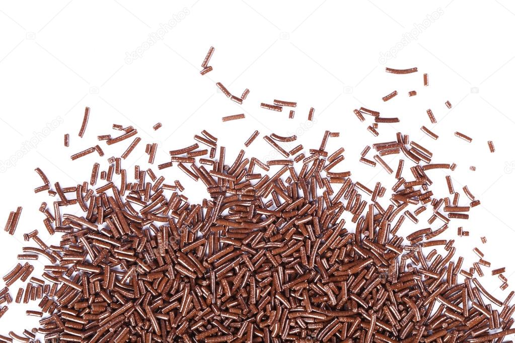Chocolate sprinkles on white background