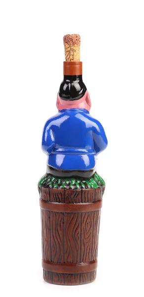 Souvenir fles wijn. man dringende druiven. — Stockfoto