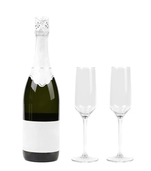 Champagne fles en twee glazen geïsoleerd op wit — Stockfoto