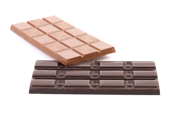 Leite e barras de chocolate escuro . — Fotografia de Stock